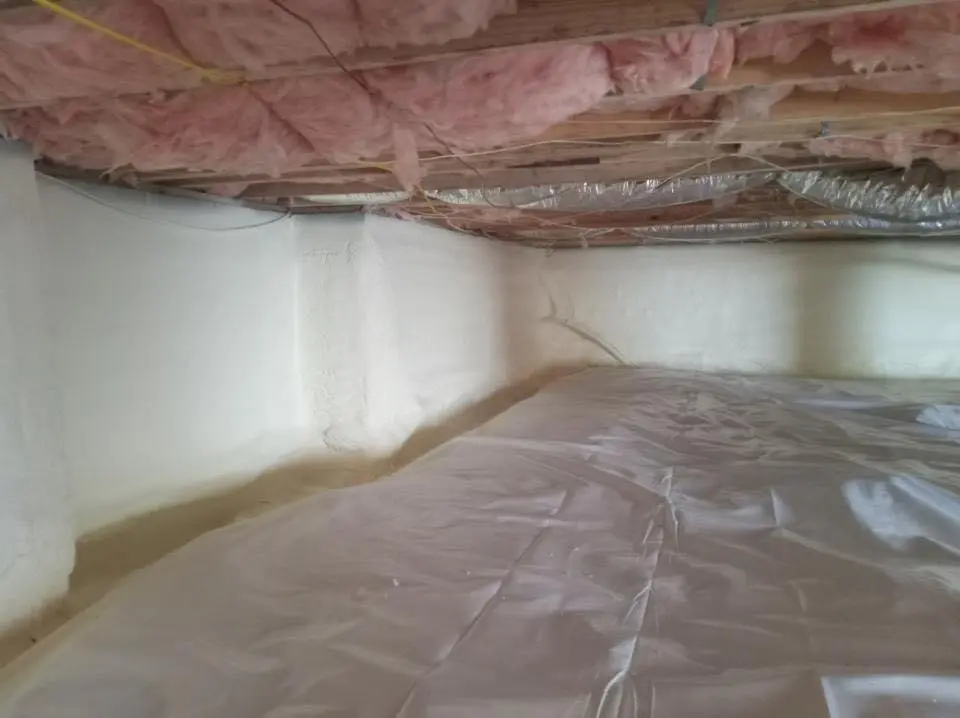 Crawl space encapsulation with closed-cell spray foam for Storm Damage Roof Repair in Lincoln Park